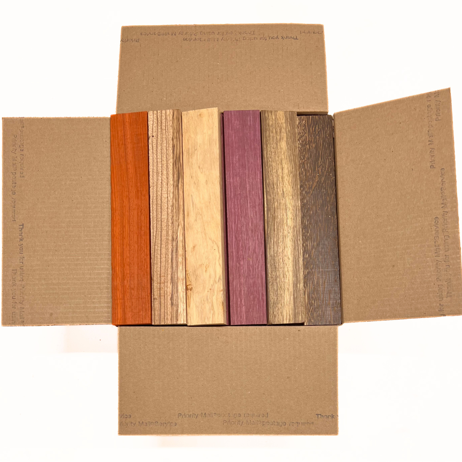 Box of Mixed Exotic Species (Purpleheart,Padauk,Black Palm,Bubinga,Tamarind,Limba)12" x 12" x 6" Wood Scrap DIY Craft Carving Scroll Short Lumber Cutoff Boards - Exotic Wood Zone - Buy online Across USA 