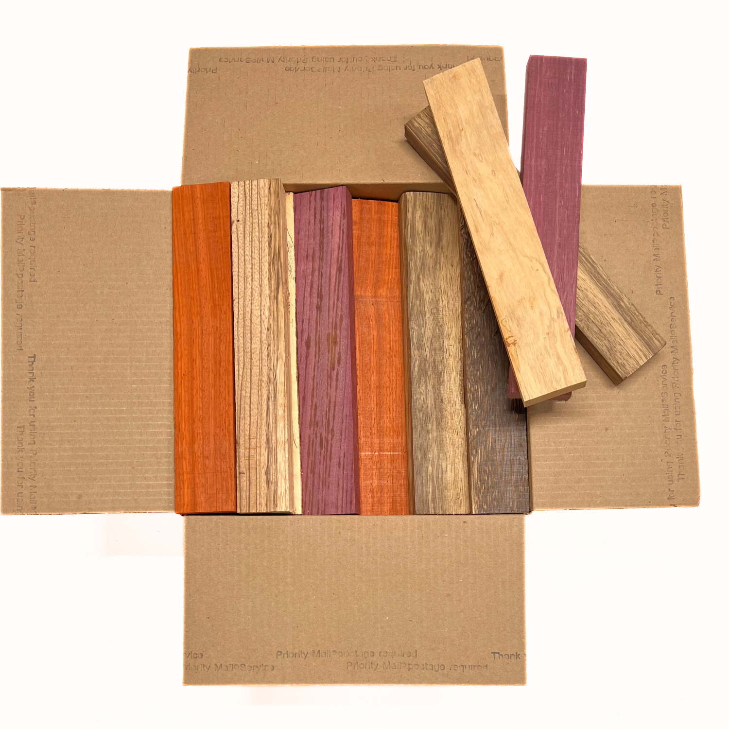 Box of Mixed Exotic Species (Purpleheart,Padauk,Black Palm,Bubinga,Tamarind,Limba)12" x 12" x 6" Wood Scrap DIY Craft Carving Scroll Short Lumber Cutoff Boards - Exotic Wood Zone - Buy online Across USA 