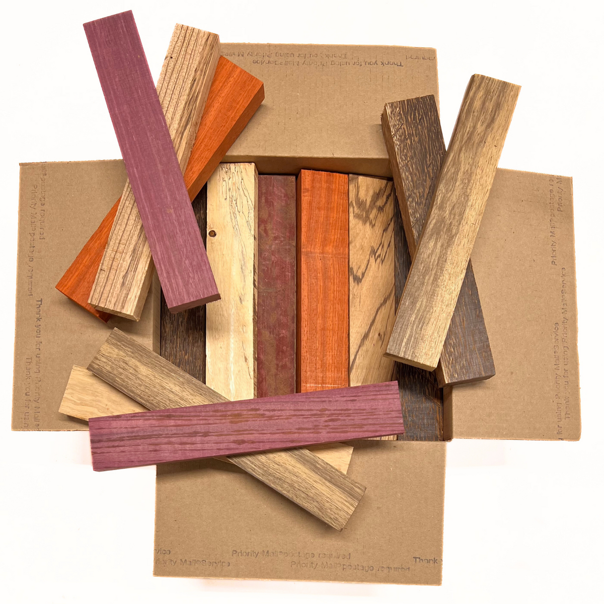 Box of Mixed Exotic Species (Purpleheart,Padauk,Black Palm,Bubinga,Tamarind,Limba)12" x 12" x 6" Wood Scrap DIY Craft Carving Scroll Short Lumber Cutoff Boards - Exotic Wood Zone - Buy online Across USA 